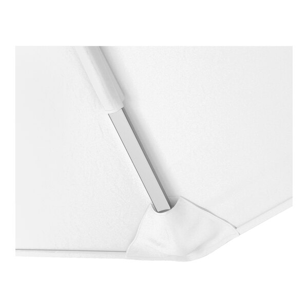 A close-up view of a white cantilever umbrella with a silver aluminum frame and Sunbrella awning-grade canopy.