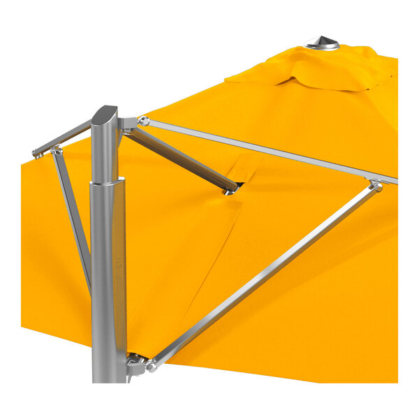 A square cantilever umbrella with a sunflower yellow canopy and a silver aluminum frame.