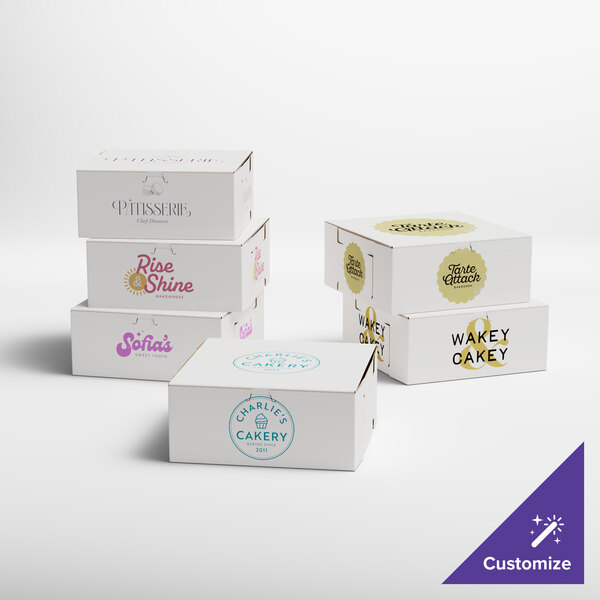 A set of customizable white bakery boxes with various bakery logos printed on them.