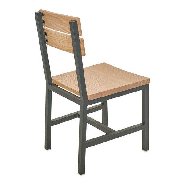 A chair with a powder-coated steel frame and natural oak seat and slat back.