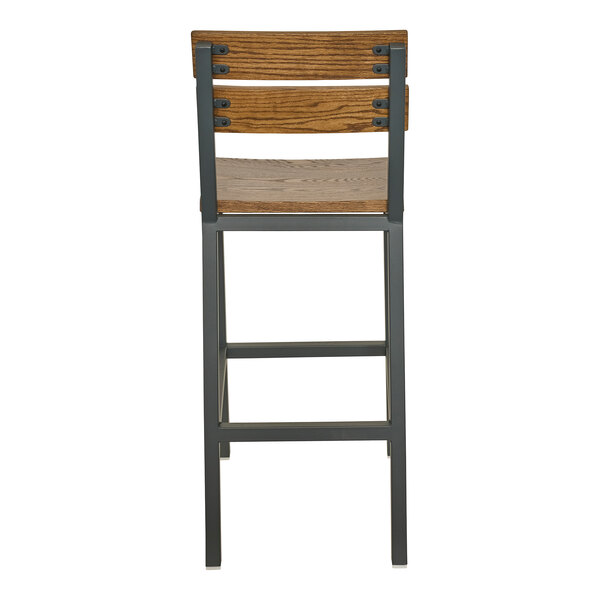 A bar stool with a powder-coated steel frame and warm oak slat back and seat.