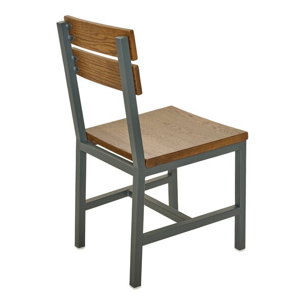 A chair with a powder-coated steel frame and warm oak seat and slat back.