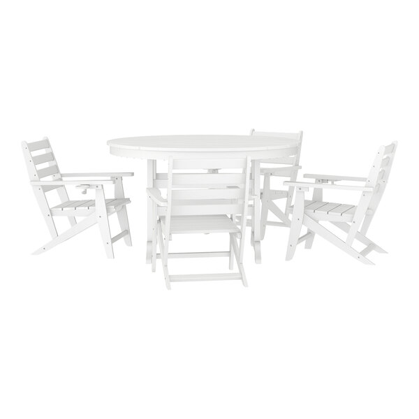 A white outdoor dining set featuring a round table and four Adirondack chairs.