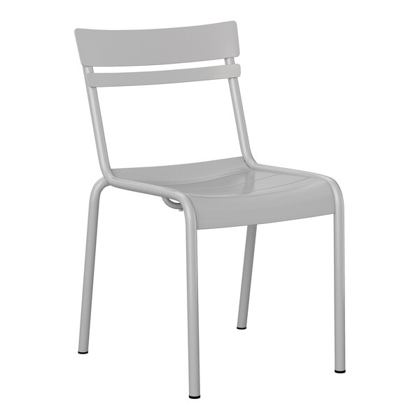 A silver steel stackable side chair with a slat back design suitable for indoor or outdoor use.