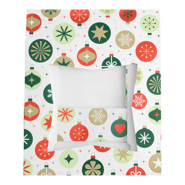 A festive bakery box with a clear window and a colorful ornament pattern in red, green, and gold.