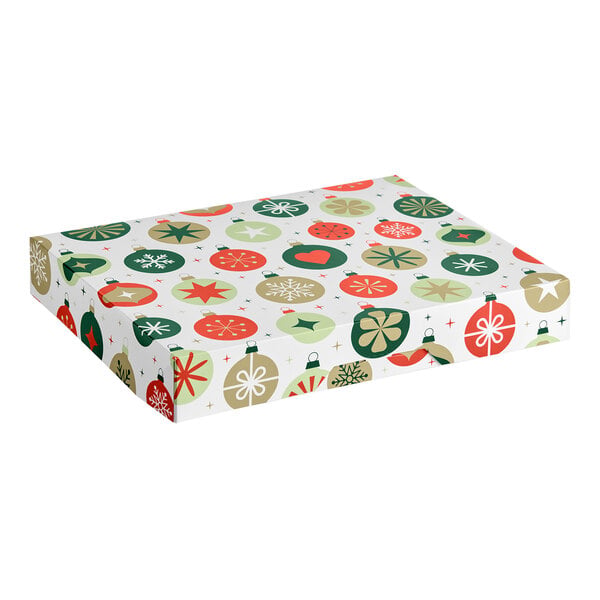 A rectangular box decorated with a festive ornament pattern in red, green, and gold colors.