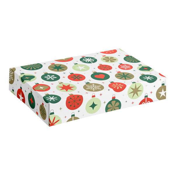 A rectangular box decorated with a festive ornament pattern in red, green, and gold colors.