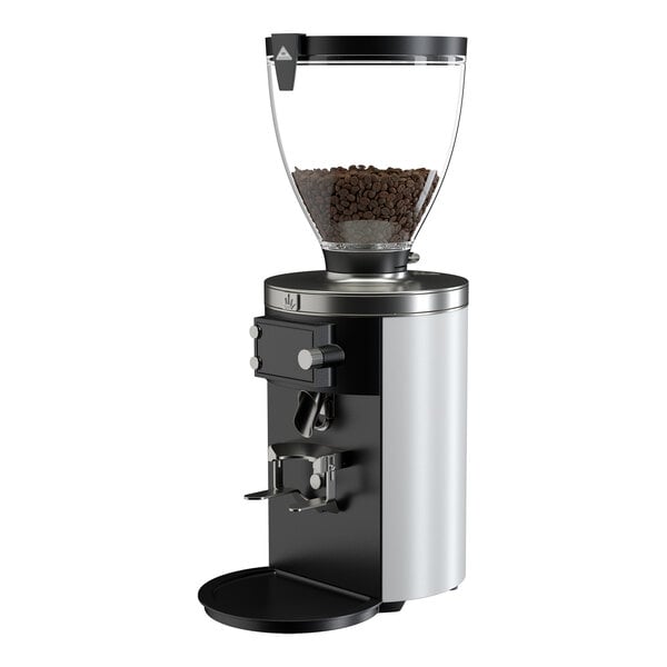 A white on-demand espresso grinder with a transparent hopper containing coffee beans.