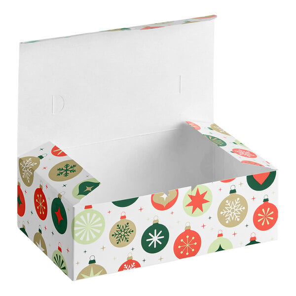 An open rectangular box with a festive ornament pattern in red, green, and gold on a white background.