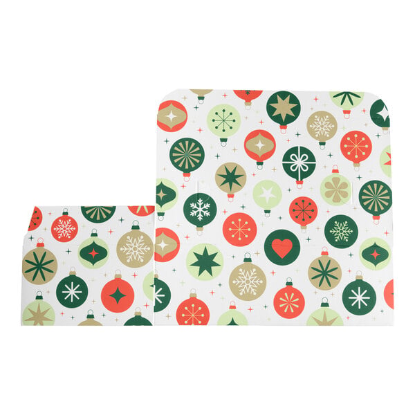 Two rectangular boxes with a festive ornament pattern in green, red, and gold on a white background, featuring various holiday designs such as stars, snowflakes, and hearts.