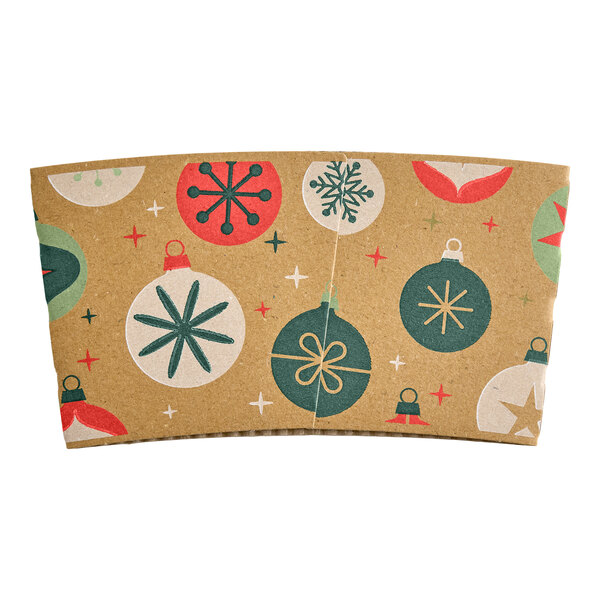 A brown coffee cup sleeve decorated with colorful Christmas ornament designs in red, green, and white.