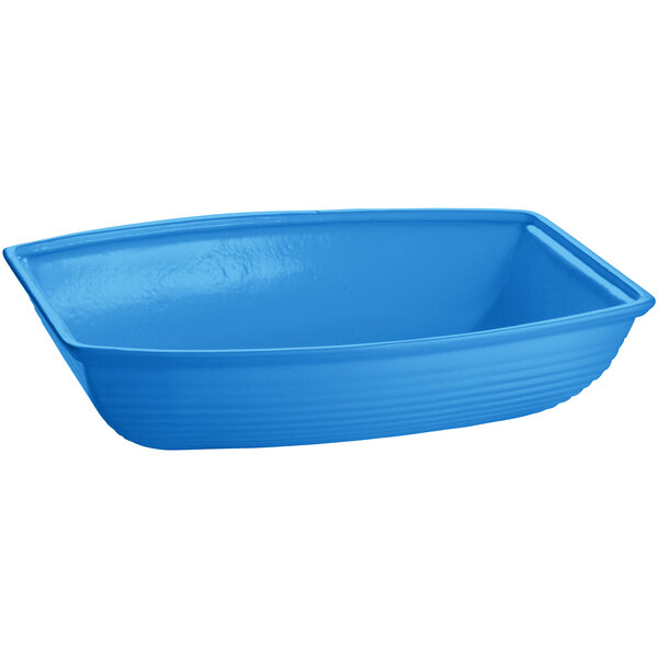 A sky blue cast aluminum bowl with a white background.