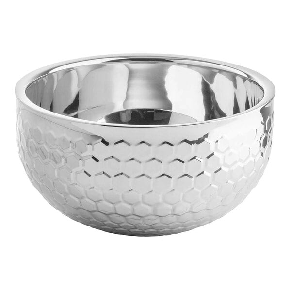 A round stainless steel serving bowl with a honeycomb pattern and double-walled construction.