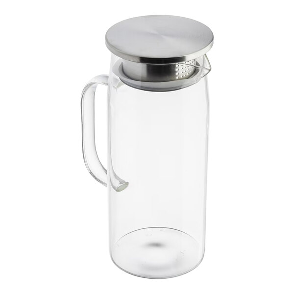 A clear glass pitcher with a handle and a stainless steel lid.