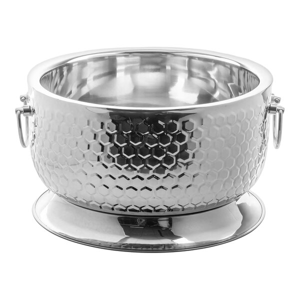 A round stainless steel beverage tub with a honeycomb pattern, side handles, and a raised base.