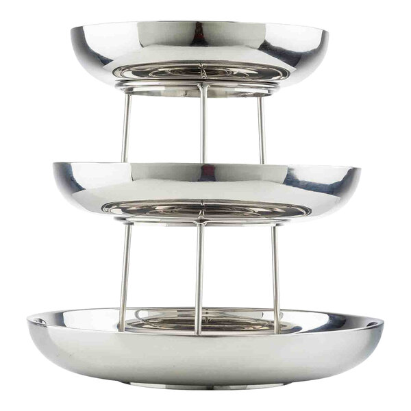 A three-tiered, round, double-walled stainless steel seafood tower.