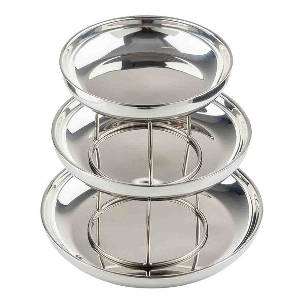 A three-tiered, round, double-walled stainless steel seafood tower.
