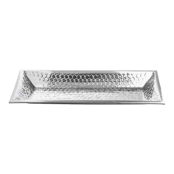 A rectangular stainless steel serving bowl with a honeycomb pattern.