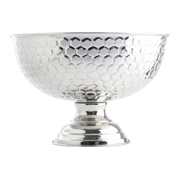 A round stainless steel punch bowl with a honeycomb pattern and a footed base.