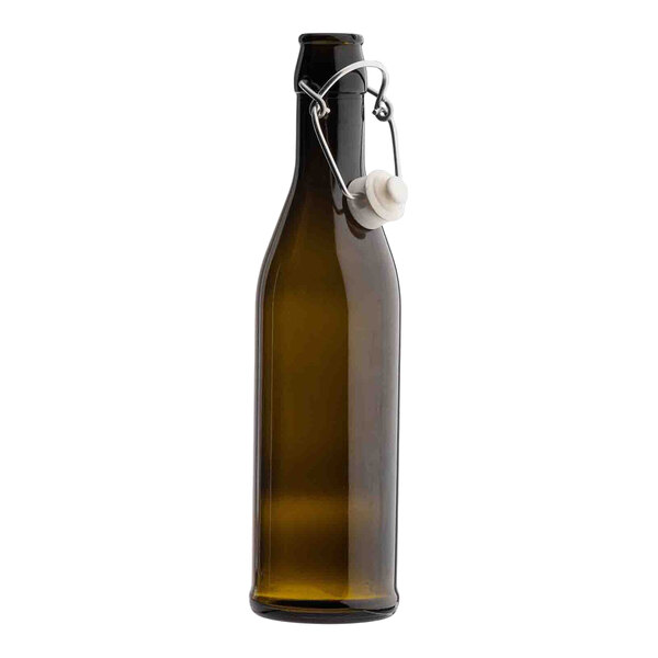 A dark green glass cruet with a swing-top stopper.