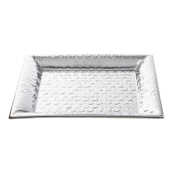 A square stainless steel serving tray with a honeycomb pattern.