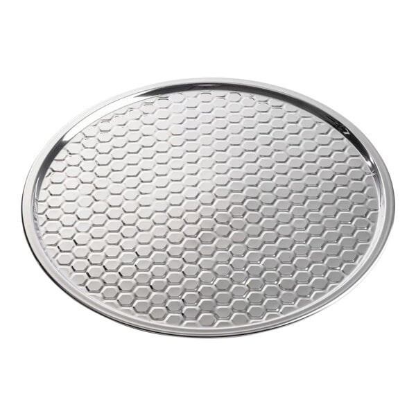 A round stainless steel serving tray with a honeycomb pattern.