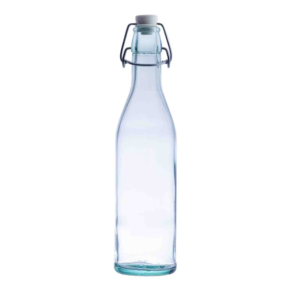 A green-tinted glass cruet with a stopper and metal clasp.