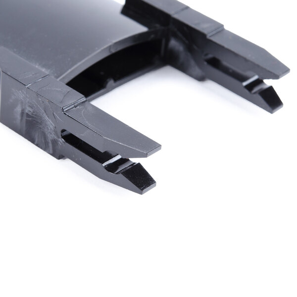 A black plastic Hamilton Beach container guide with many holes.