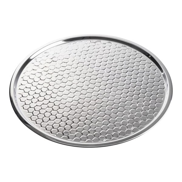 A round stainless steel serving tray with a honeycomb pattern.