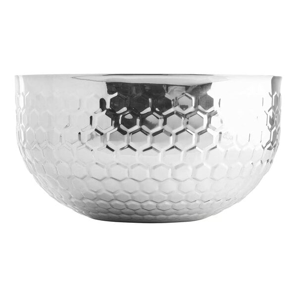 A round stainless steel serving bowl with a honeycomb pattern and double-walled construction.