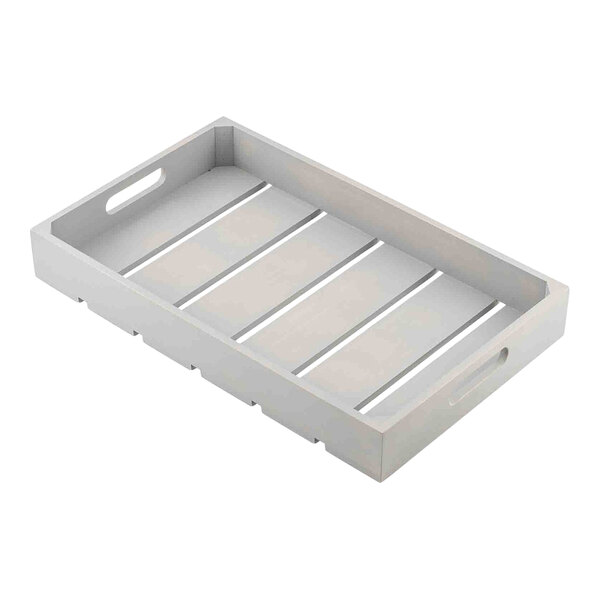 A full size gray wood serving and display crate with slatted base and cutout handles on the sides.