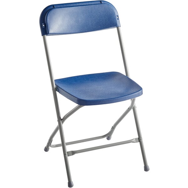 A blue folding chair with a contoured plastic seat and backrest, supported by a metal frame.