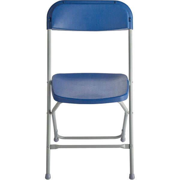A blue folding chair with a contoured plastic seat and backrest, supported by a light gray metal frame.