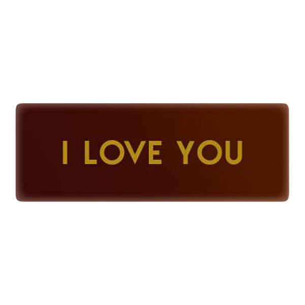 A rectangular chocolate decoration with the words 'I LOVE YOU' written on it.