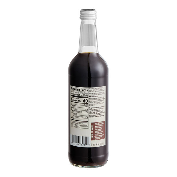 A glass bottle of Fever-Tree Espresso Martini Mix with a white cap and nutrition label visible.