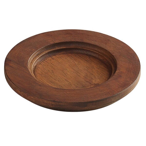 A round, shallow wooden plate with a chestnut finish and a recessed center.