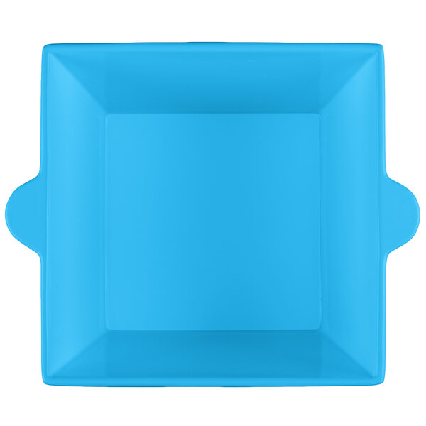 A sky blue square bowl with handles.