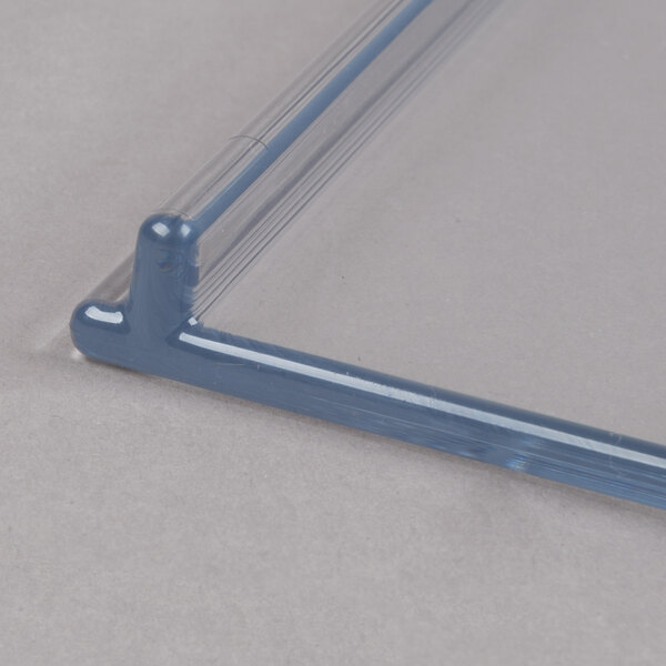 A clear plastic splash shield with a blue plastic frame and handle.