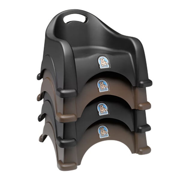 A stack of four black and brown plastic booster seats with armrests and a handle on the backrest.