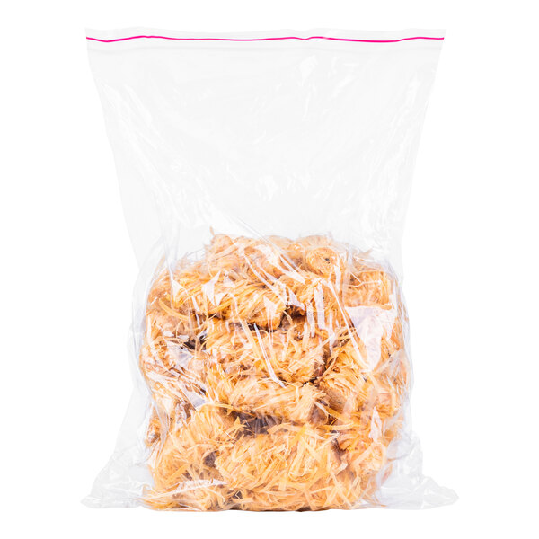 A clear plastic bag containing multiple natural wood instant fire starter twists.