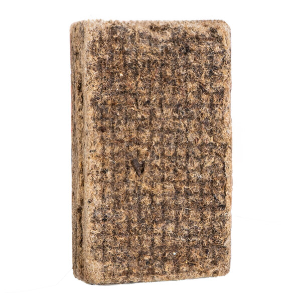 A rectangular block of natural wood sawdust and wax used as an instant fire starter.