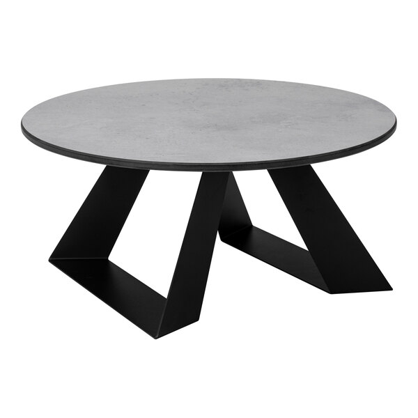 A round table with a gray top and two wide, black, angled legs.