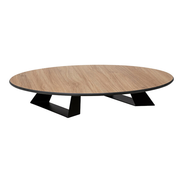 A round, low-profile riser with a natural wood-like top surface and black angular supports.