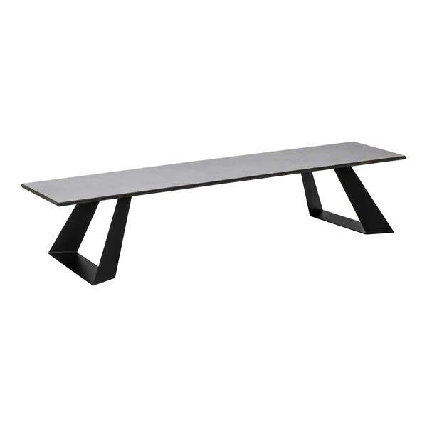 A modern rectangular riser with a concrete gray top and two angular black supports.