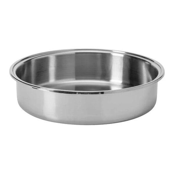 A round, shallow stainless steel pan with a smooth, reflective surface and a wide rim.
