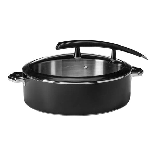A black round buffet server or induction chafer with a glass lid and two side handles.