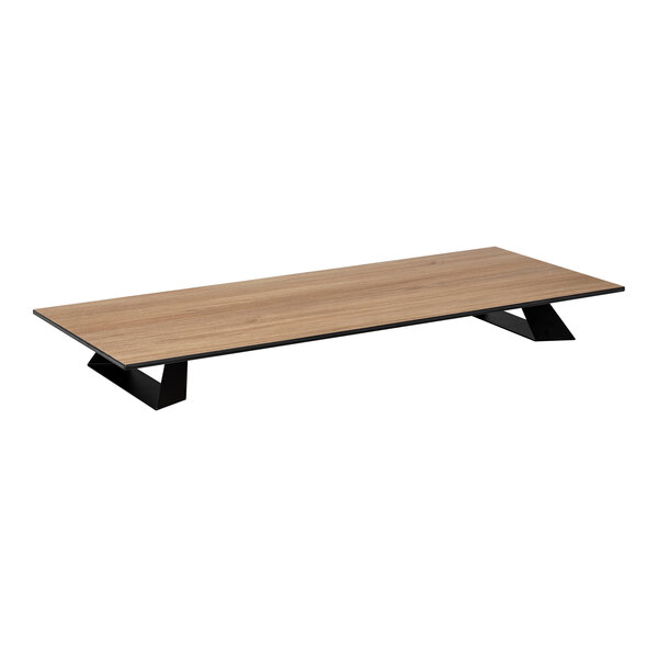 A low, rectangular platform with a natural wood-like surface and black angled supports.