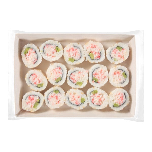 A tray of fourteen California sushi rolls filled with imitation crab, cucumber, and avocado.