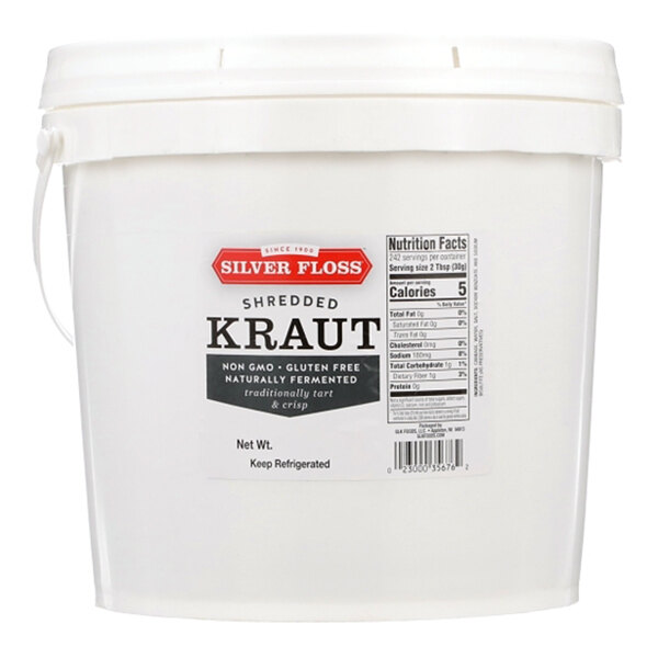 A white plastic tub of Silver Floss shredded sauerkraut with a handle and nutrition label.