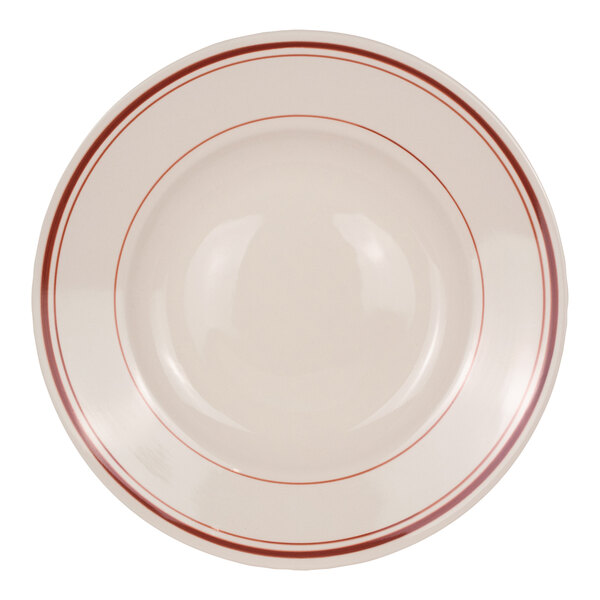 A round, white bowl with two red bands around the rim.